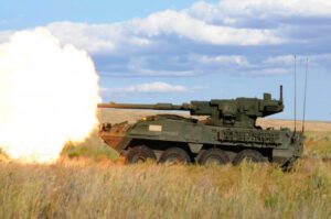 A Stryker Mobile Gun System (MGS) fires its 105 mm main gun.