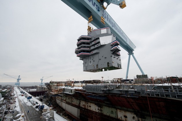 NEWPORT NEWS, Va. (Jan. 26, 2013) Huntington Ingalls Industries celebrated significant progress today as the 555-metric ton island was lowered onto the nuclear-powered aircraft carrier Gerald R. Ford (CVN 78) at the company's Newport News Shipbuilding (NNS) division. The 60-foot long, 30-foot wide island was the 452nd lift of the nearly 500 total lifts needed to complete the aircraft carrier. (U.S. Navy photo courtesy Huntington Ingalls Industries/Released)