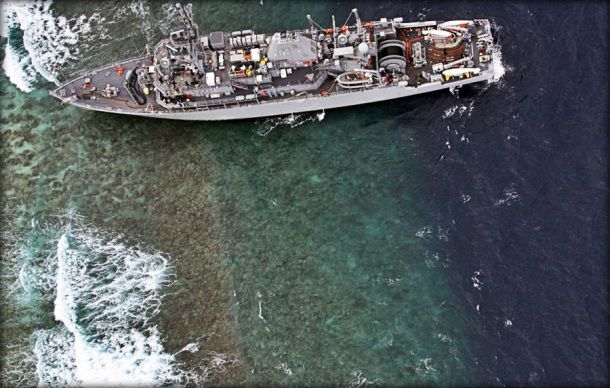 USS Guardian grounded in this position. Strong waves later shoved ship sideways.