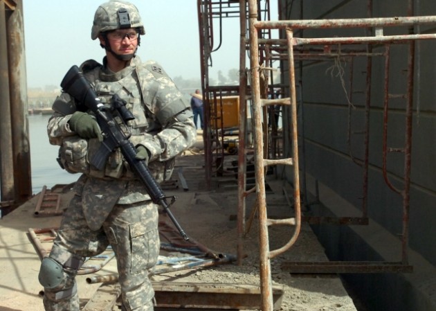 An Army soldier wearing today's protective -- but bulky and awkward -- body armor.
