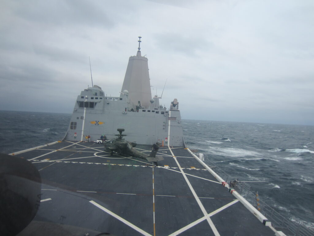 One of Lt. Col. Fidler's Apaches on the tilting deck of a Navy ship.
