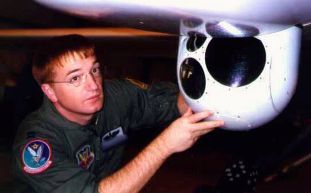 Scott Swanson with Predator sensor ball - undated - from Scott Swanson (4)