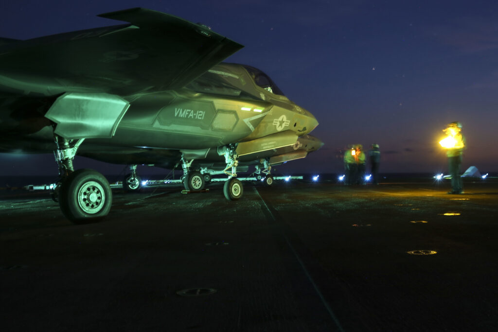 USS Wasp (LHD-1), At Sea - An F-35B Lightning II prepares to taxi on the flight deck of USS Wasp (LHD-1) during night operations May, 22, 2015. The current Marine Corps operational test, scheduled to continue through the end of May, will assess the integration of the F-35B while operating across a wide array of flight and deck operations, maintenance operations and logistical supply chain support in an at-sea environment. (Marine Corps photo by Cpl. Anne K. Henry/RELEASED)