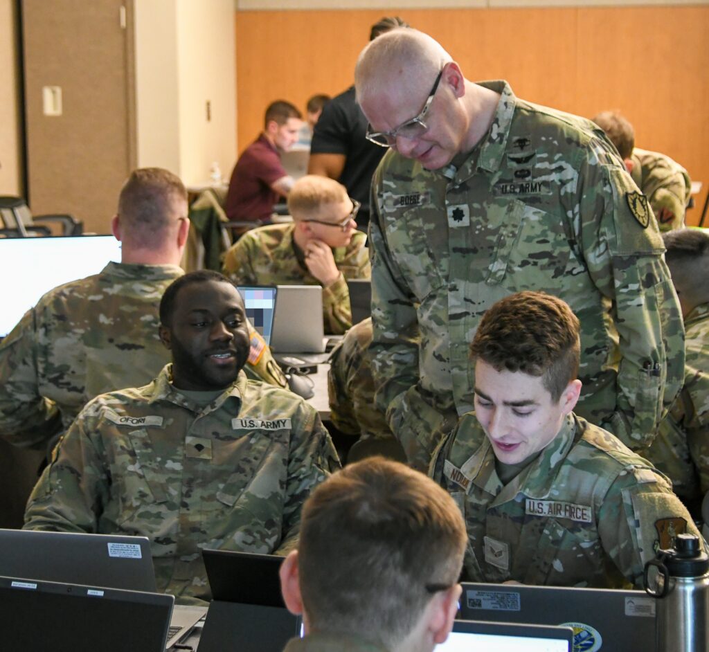 Members of the Maine National Guard review training during Cyber Yankee 2025 on May 14, 2025. (Photo by Lt. Col. Jeffrey Roosevelt, Maine National Guard.)