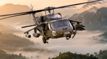 Armed BLACK HAWK helicopter with CLAW wing carrying Modular Effects Launcher and Spike NLOS missiles.