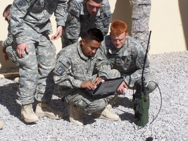 Soldiers use a Harris PRC-117G radio in Afghanistan