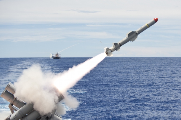 A Navy cruiser launches a Harpoon anti-ship missile, a 1977 design unsuited for long-range war in the Pacific.