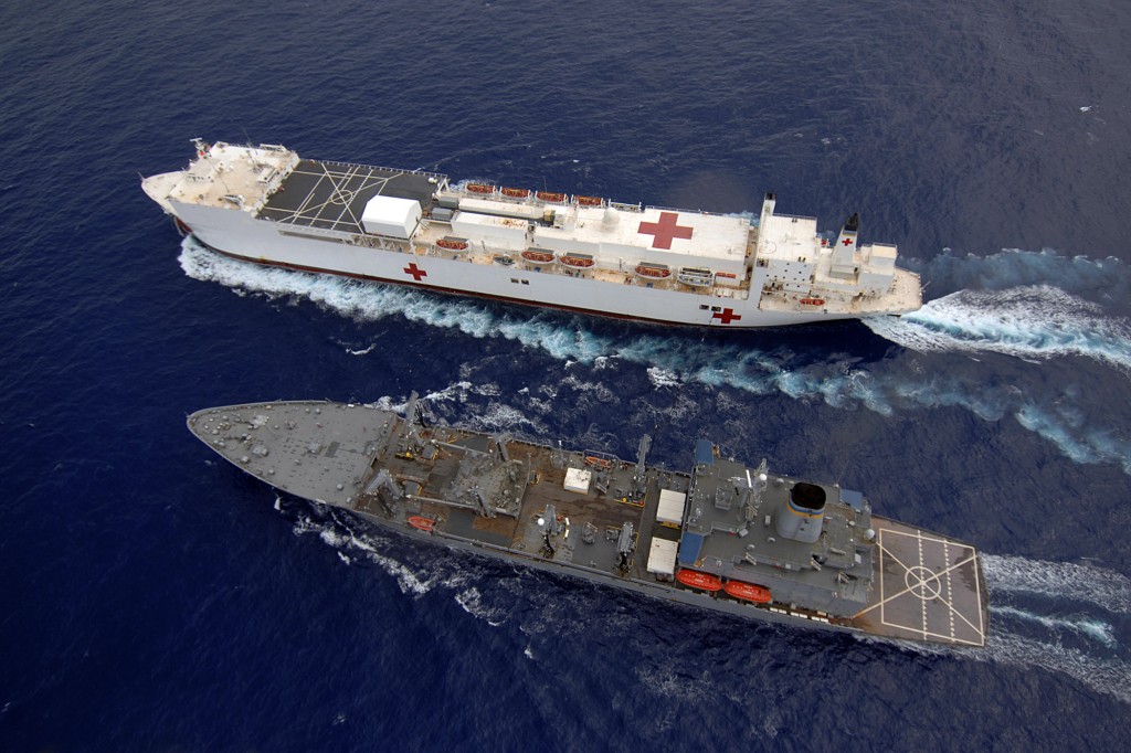 The US hospital ship Mercy gets resupplied at sea.