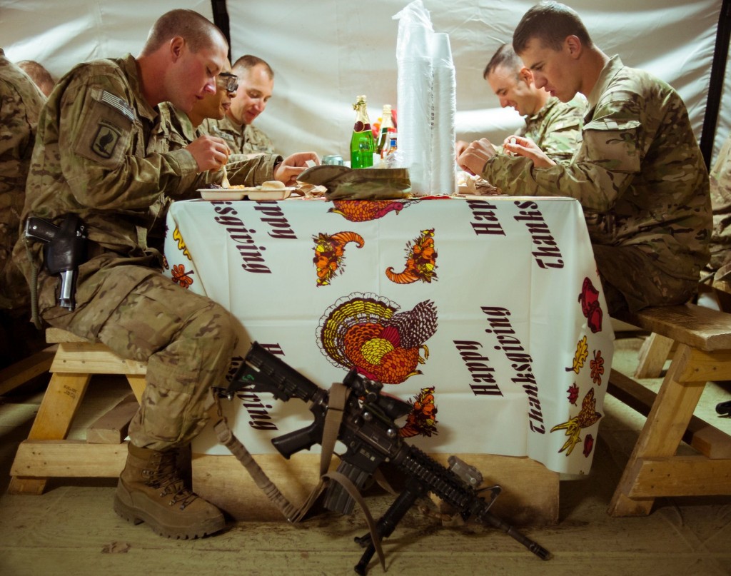 Soldiers from the 173rd Airborne Brigade eat a makeshift Thanksgiving at their outpost south of Kabul in 2012.