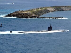 A US Navy attack submarine enters Apra Harbor in Guam.