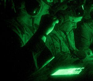 Marines use off-the-shelf Samsung tablets to coordinate operations from the back of a V-22 Osprey in an Infantry Officer Course experiment.