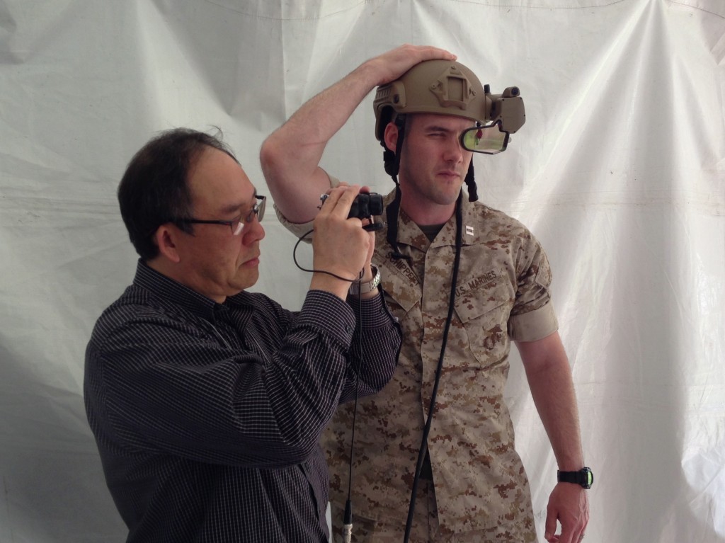 A Marine Captain and a BAE contractor with DARPA's prototype ULTRA-Vis helmet display.