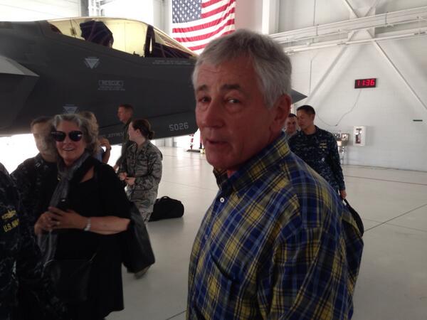 Defense Sec. Chuck Hagel jokes with reporters at Eglin Air Force Base. (The aircraft behind him is an F-35A).
