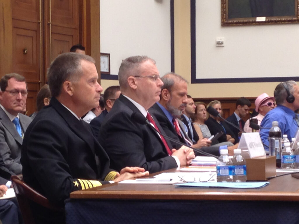 Deputy Defense Secretary Robert Work (center) settles in for a brutal hearing, flanked by Adm. James Winnefeld (left) and comptroller Mike McCord (right).