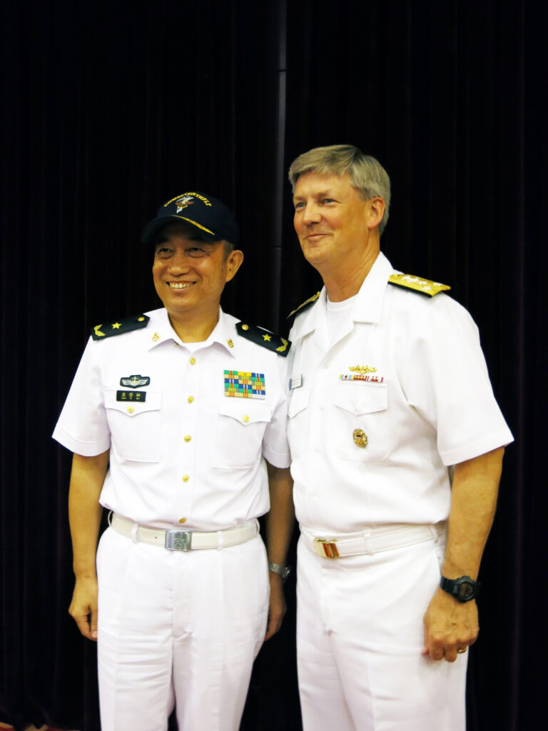 Vice Adm. Robert Thomas, Pacific Fleet commander, with PLAN North Sea Fleet commander Rear Adm. Yuan Yubai.