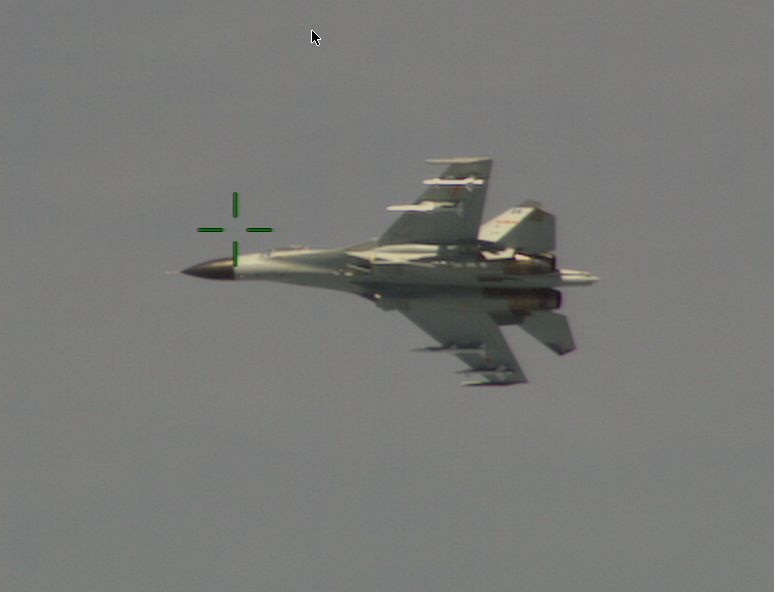 A Chinese Navy J-11 fighter buzzes a US P-8 Poseidon surveillance plane off Hainan Island in August.