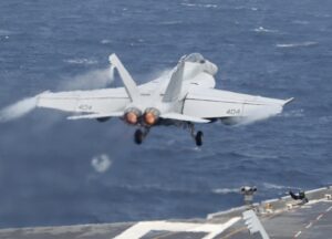 A Navy F/A-18 Super Hornet takes off from the aircraft carrier USS George Washington