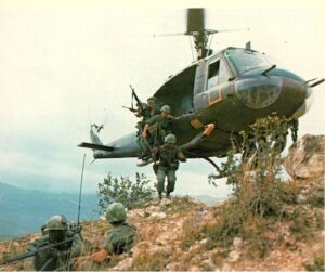 Troops dismount Huey Vietnam