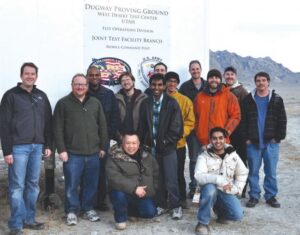 Army civilians and contractors at Dugway Proving Ground, Utah, after a drone test.
