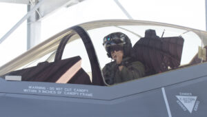 An Air Force pilot, Lt. Col. Chris Pitts, in the cockpit of his F-35A.