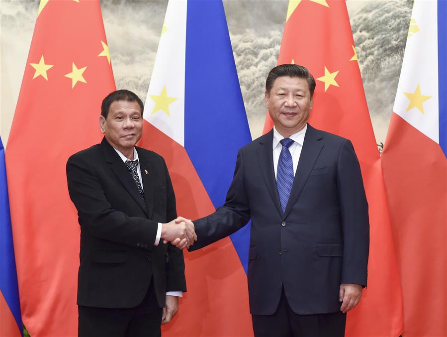 Rodrigo Duterte and Xi Jinping in Beijing Credit: Xinhua