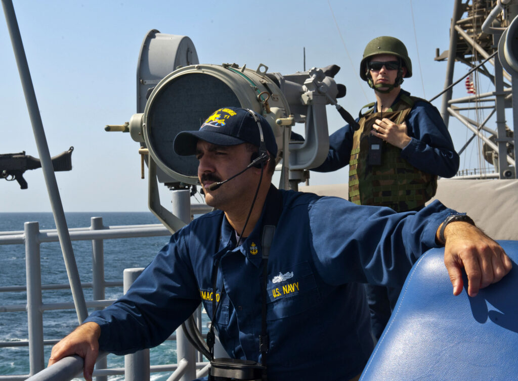 US Navy sailors watch for Iranian ships in Strait of Hormuz