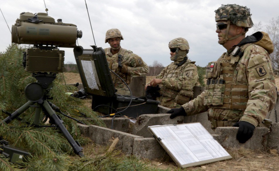 Soldiers with the 173rd Infantry Brigade Combat Team observe an impact zone from a forward observation point during Dynamic Front 2019 in Torun, Poland, March 5, 2019. The Army plans to pilot new tactical space technology during next spring's Defende... (