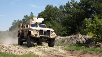 JLTV Maneuvers Over Rocks