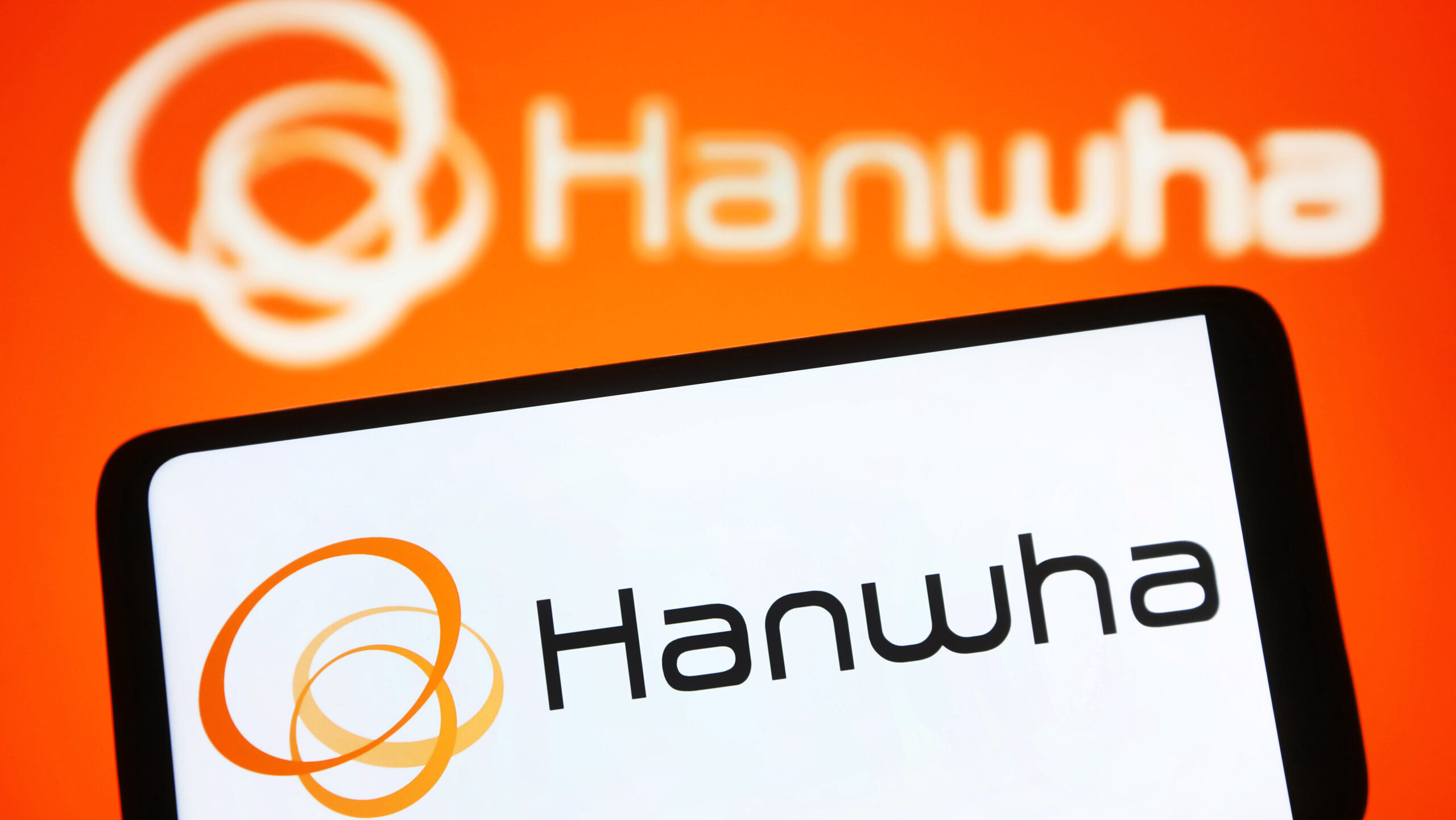 In this photo illustration, Hanwha Group logo is seen on a