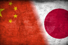 China and Japan flag with grunge metal texture