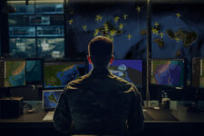 Tactical Operations: Soldier in a Modern War Room Utilizing Maps