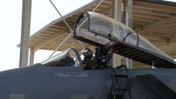 Pilot Sits in Cockpit