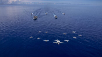 Abraham Lincoln Carrier Strike Group and Cavour Strike Group Sail in the Pacific Ocean