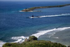 USS Asheville Departs Naval Base Guam