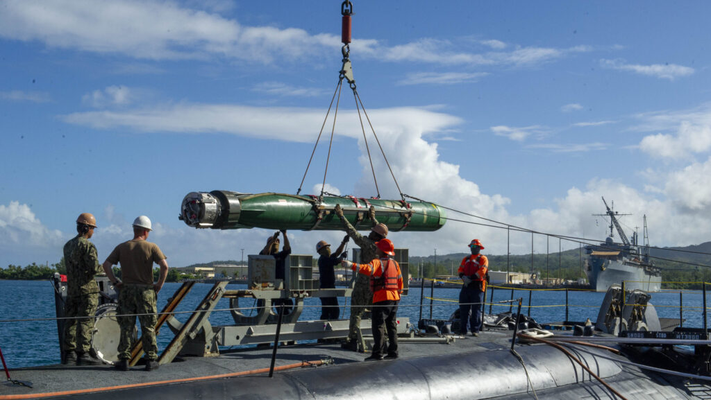 USS Frank Cable Sailors Assist Weapons Load of Mark 48 Torpedoes on USS Annapolis