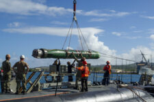 USS Frank Cable Sailors Assist Weapons Load of Mark 48 Torpedoes on USS Annapolis